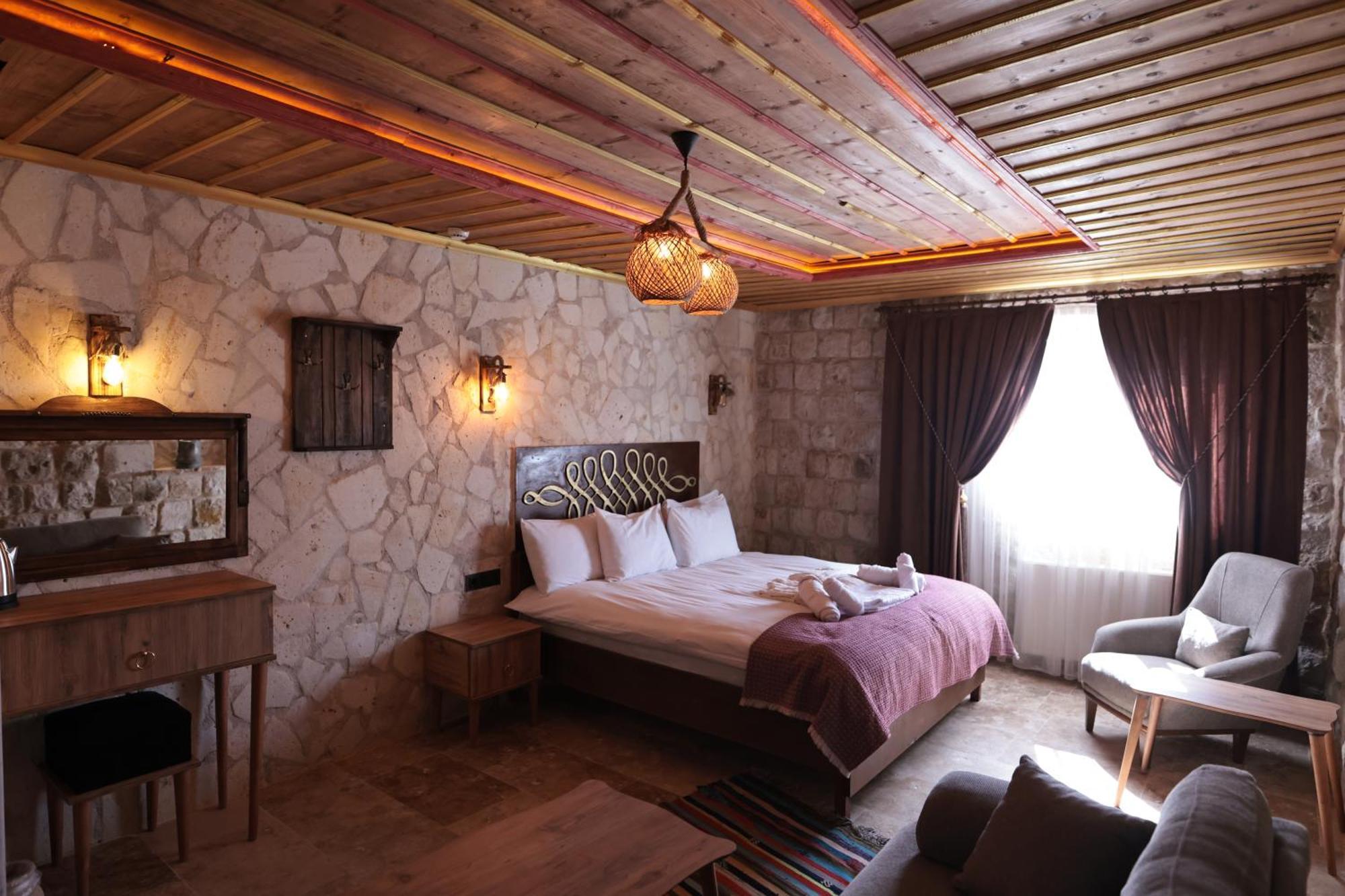 Stone Owl Otel & Restaurant Uchisar Exterior photo